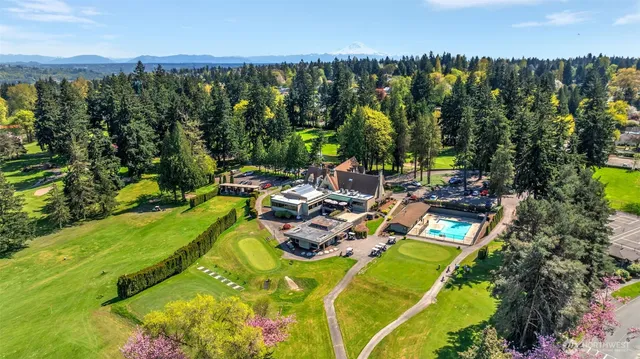 a view of a swimming pool with lounge chair