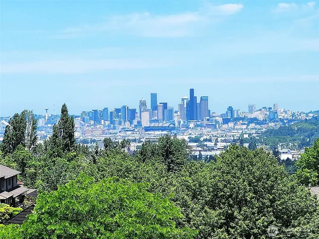a view of a city with tall buildings in the background