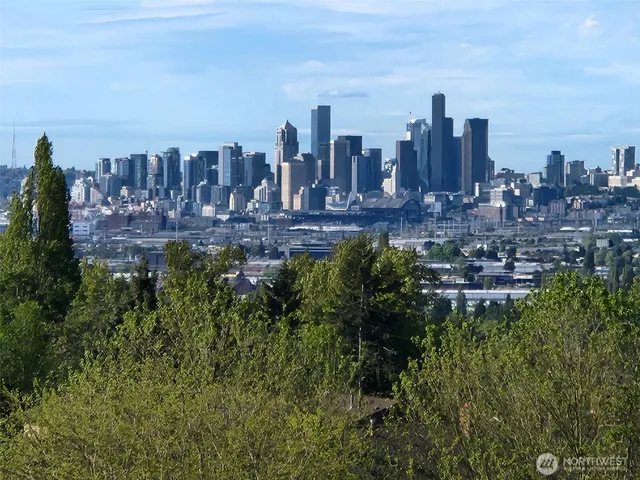 a view of a city with tall buildings