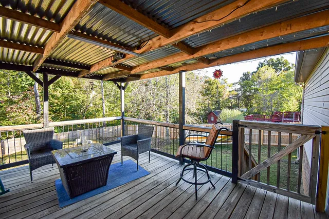 a view of chairs with wooden floor