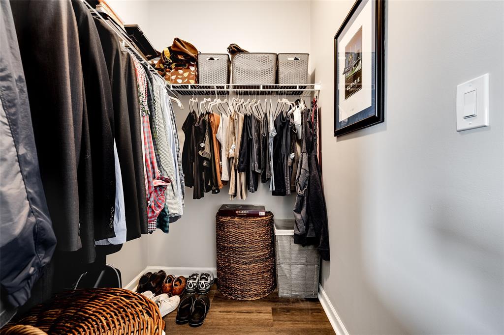 1224 Northeast 18th Avenue, Unit 1 Fort Lauderdale, FL 33304 - Photo 19 of 34 a view of walk in closet with clothes