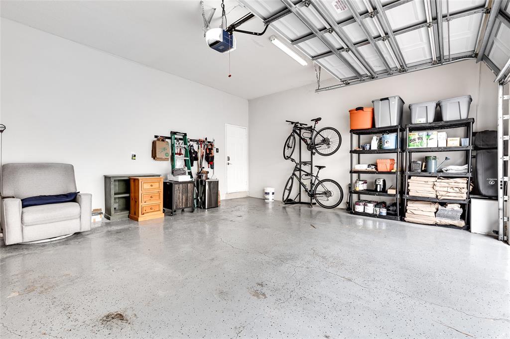 1224 Northeast 18th Avenue, Unit 1 Fort Lauderdale, FL 33304 - Photo 27 of 34 a view of a livingroom with shelves