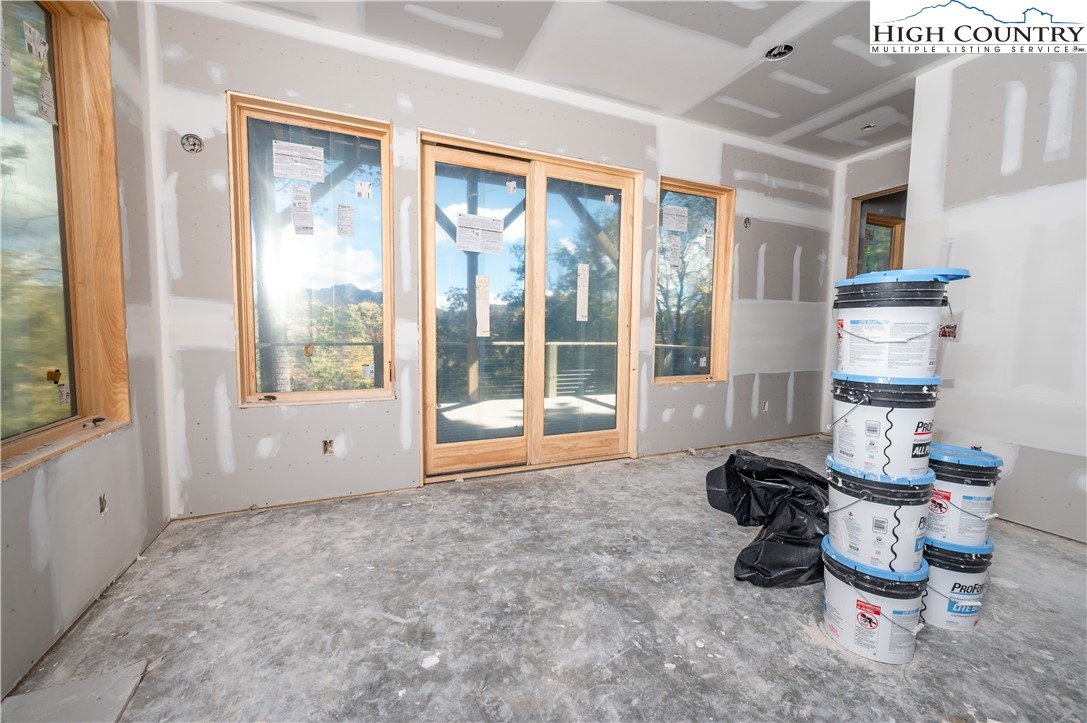 63 Two Hawks Lane Newland, NC 28657 - Photo 17 of 23 a room with furniture and a large window