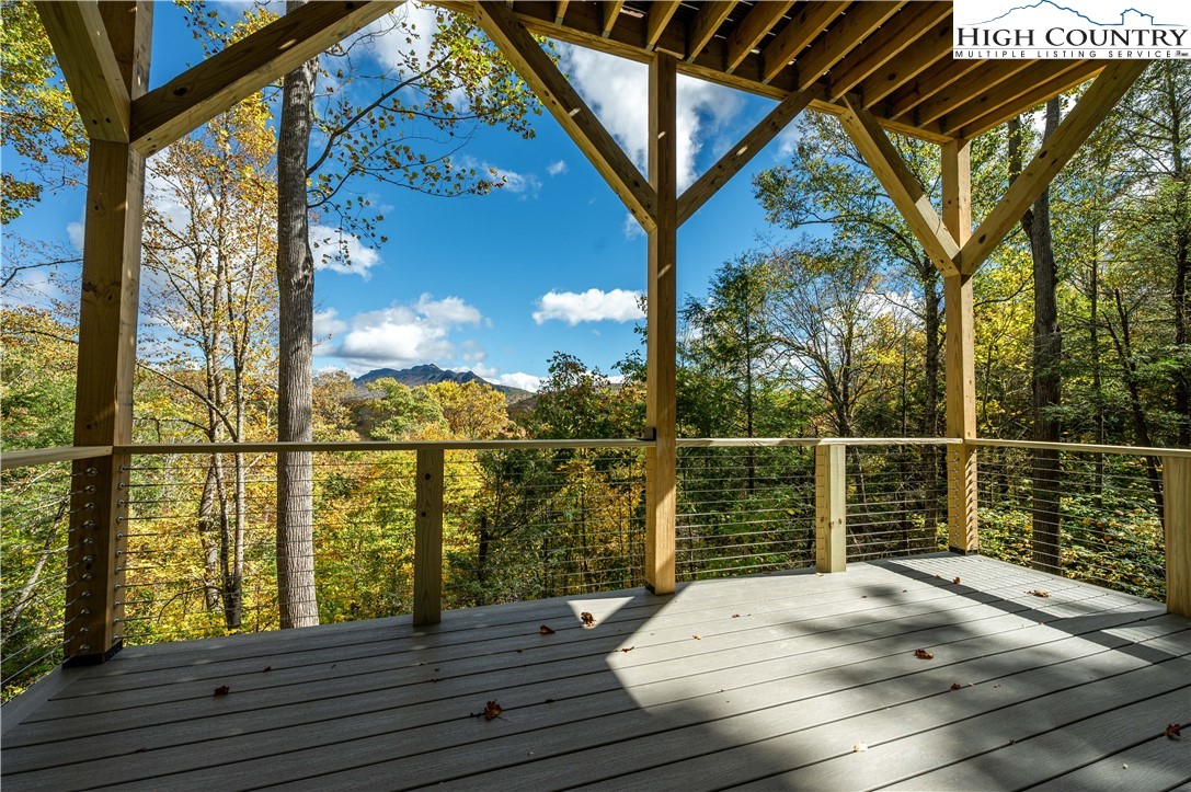 63 Two Hawks Lane Newland, NC 28657 - Photo 20 of 23 a view of a balcony with furniture and wooden floor
