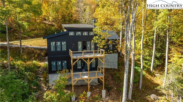 a view of a house with a small yard