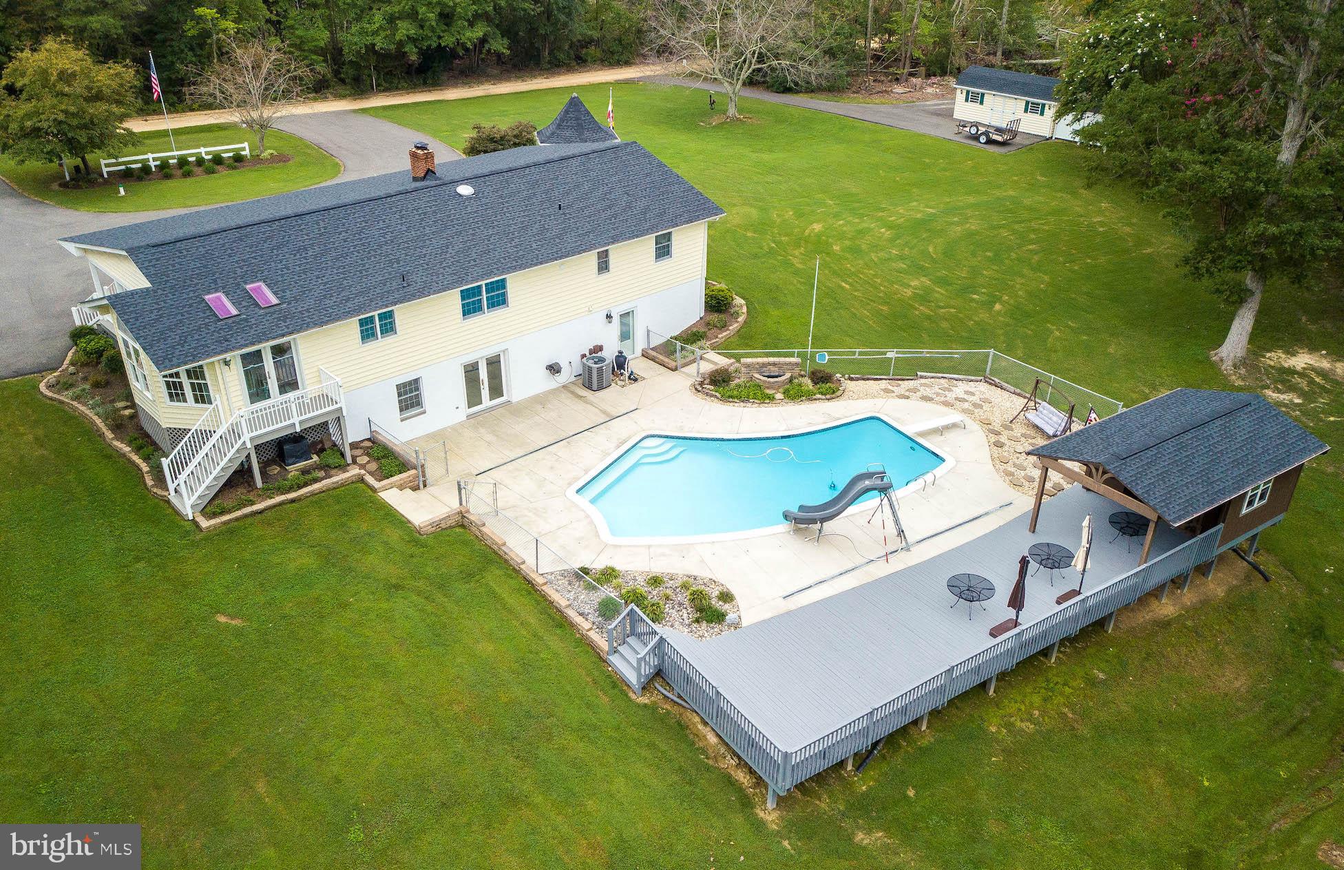 44350 Richey Road Leonardtown, MD 20650 - Photo 4 of 73 Rear view with pool, decking and pool house.