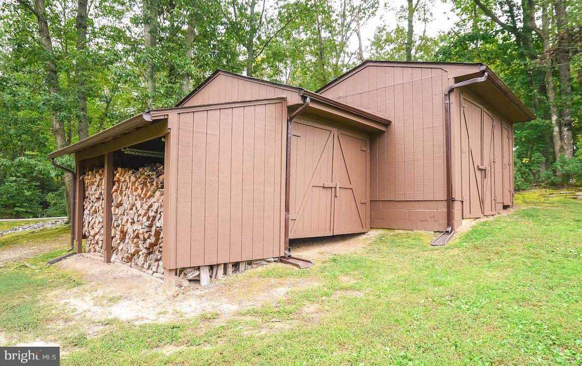 44350 Richey Road Leonardtown, MD 20650 - Photo 64 of 73 Additional Storage Shed with Wood Supply.