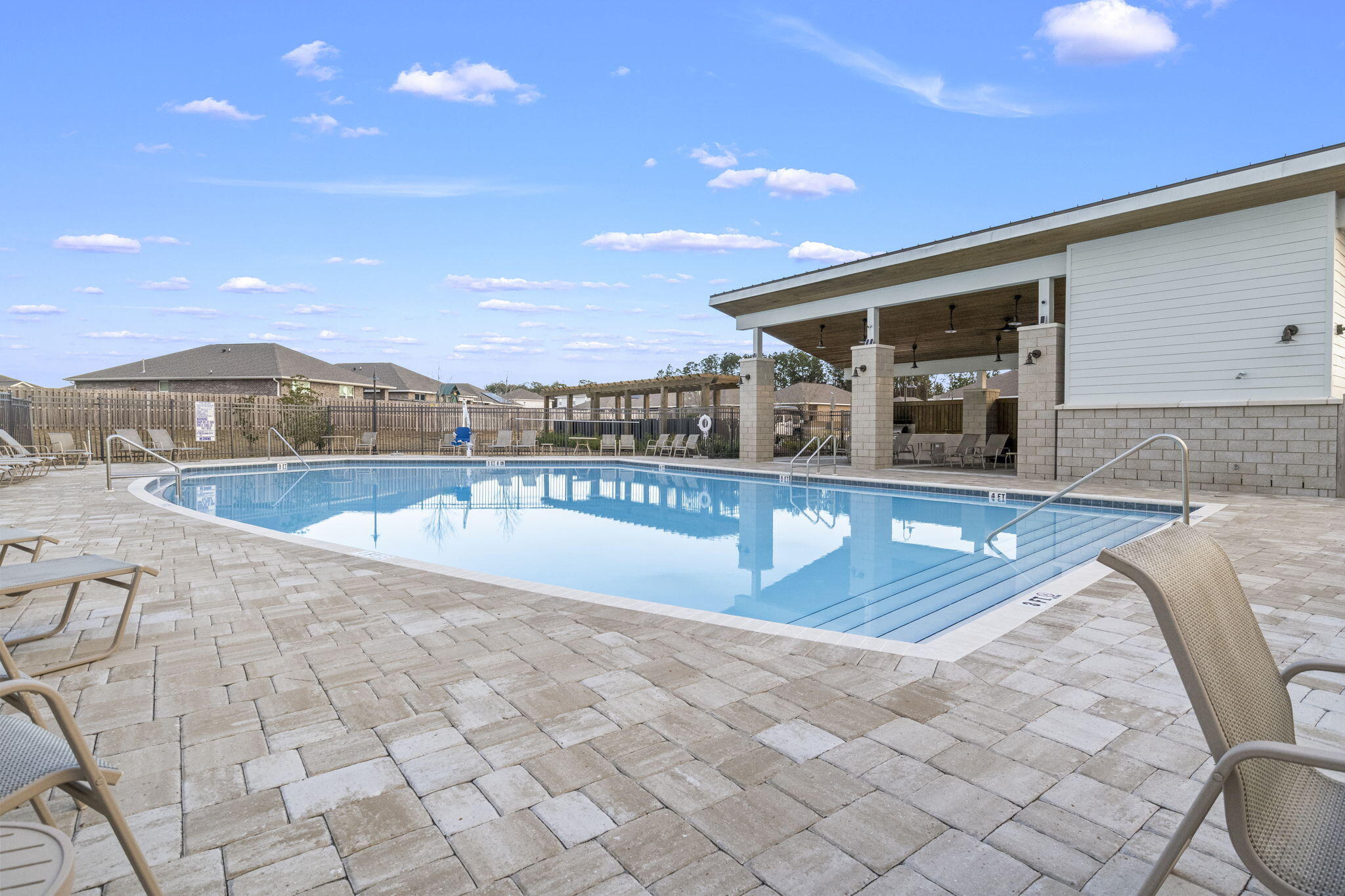 4665 Marine Loop Crestview, FL 32539 - Photo 34 of 37 a view of a swimming pool with an outdoor seating