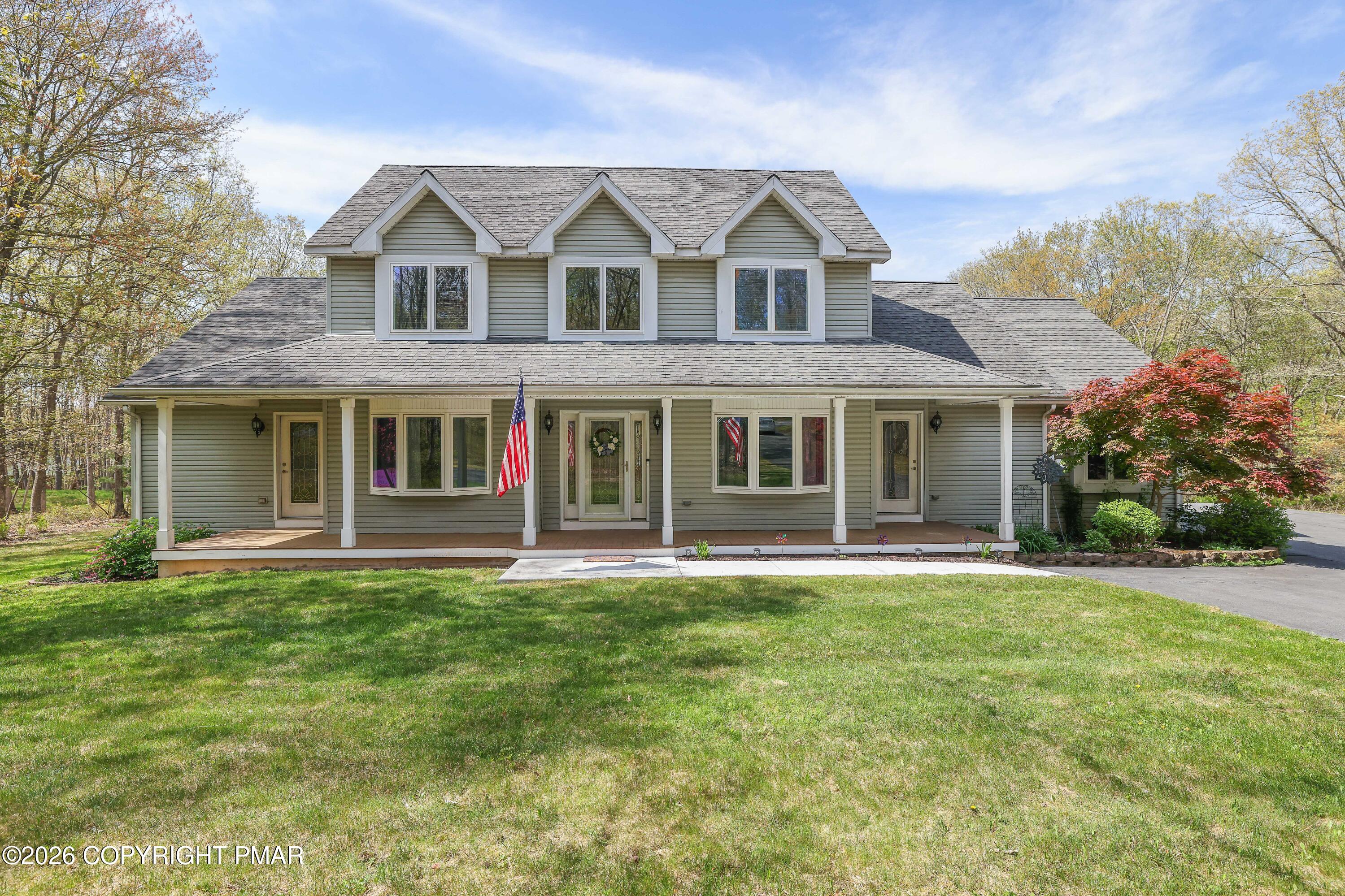 659 Behrens Road Jim Thorpe, PA 18229 - Photo 1 of 57 a front view of a house with a yard