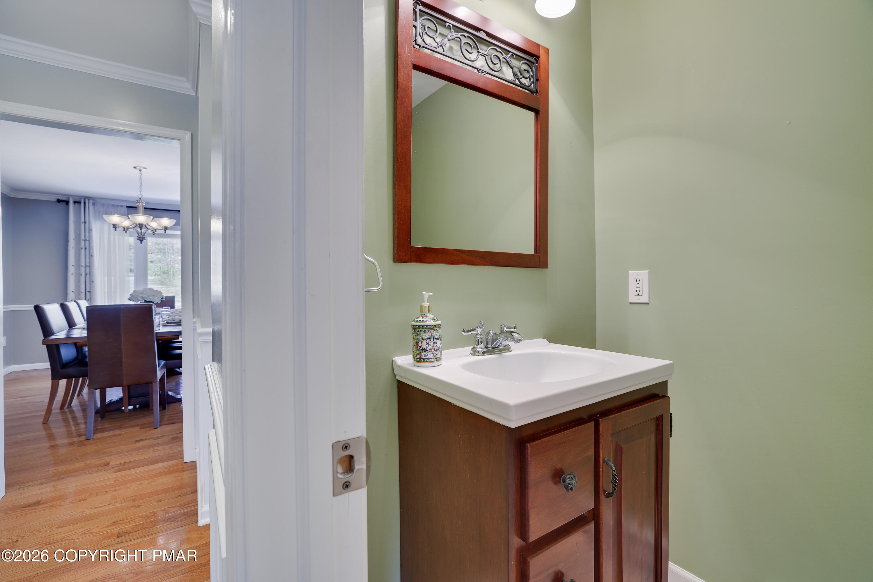 659 Behrens Road Jim Thorpe, PA 18229 - Photo 11 of 57 a bathroom with a sink a mirror and a toilet