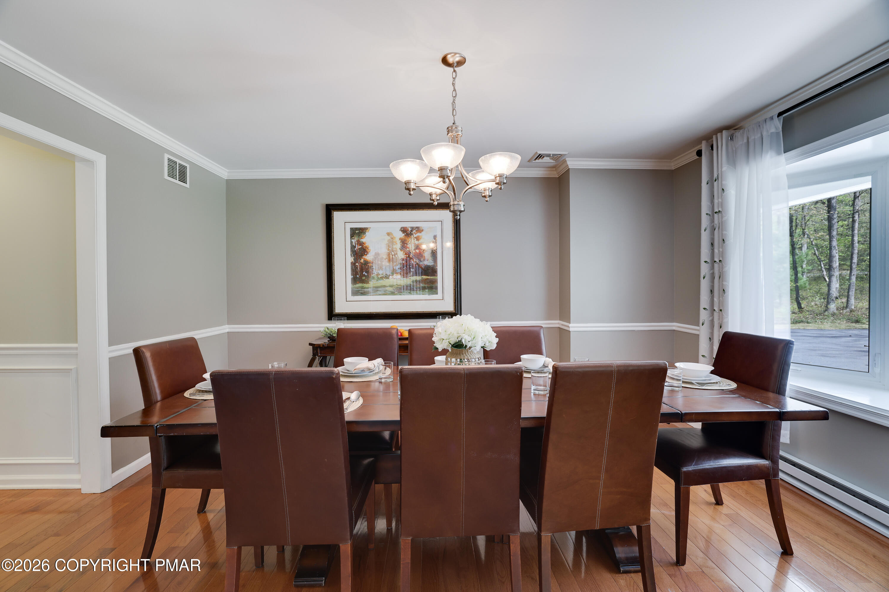 659 Behrens Road Jim Thorpe, PA 18229 - Photo 18 of 57 a view of a dining room with furniture window and wooden floor