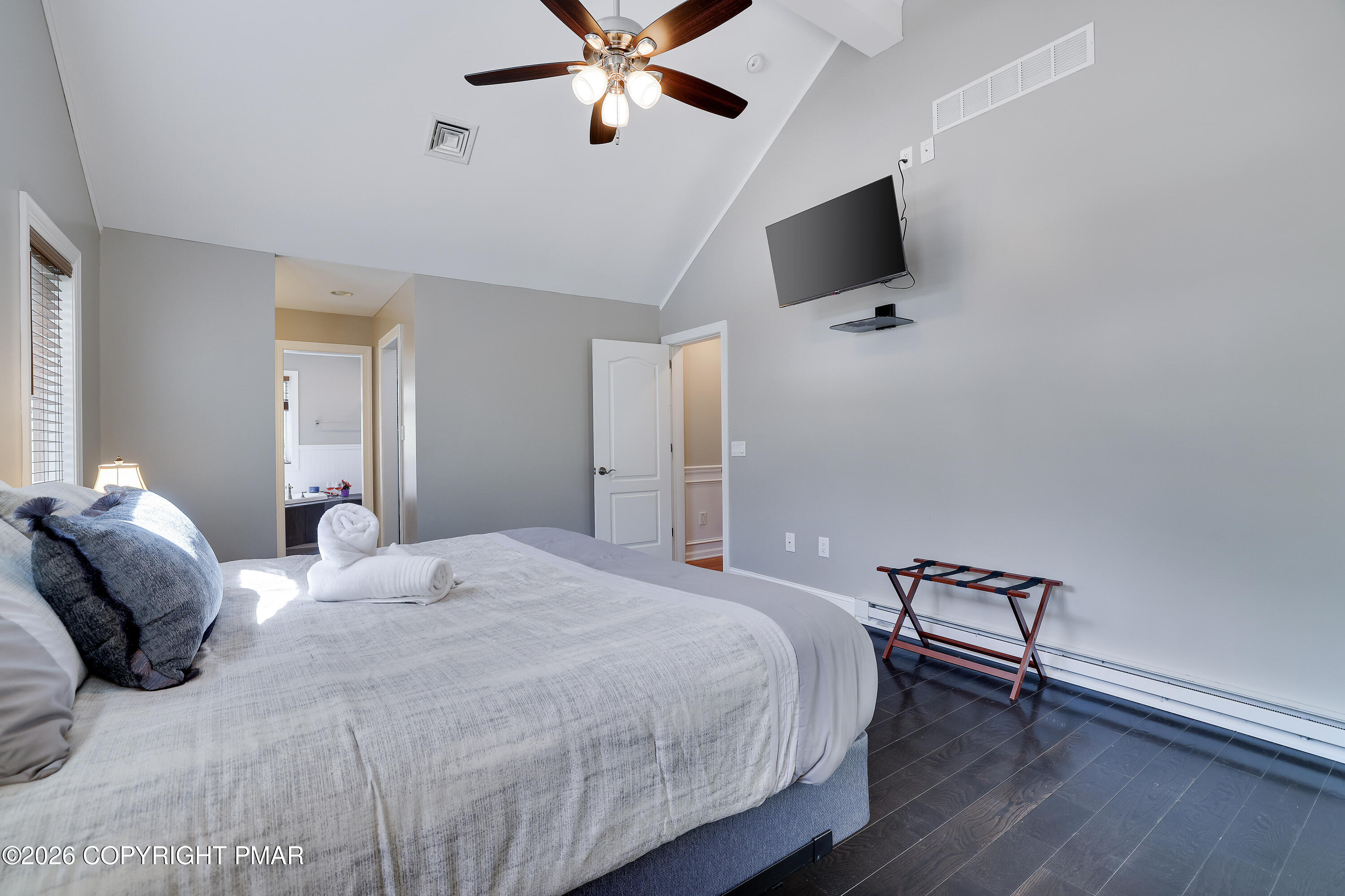659 Behrens Road Jim Thorpe, PA 18229 - Photo 21 of 57 a bedroom with a bed and a flat screen tv