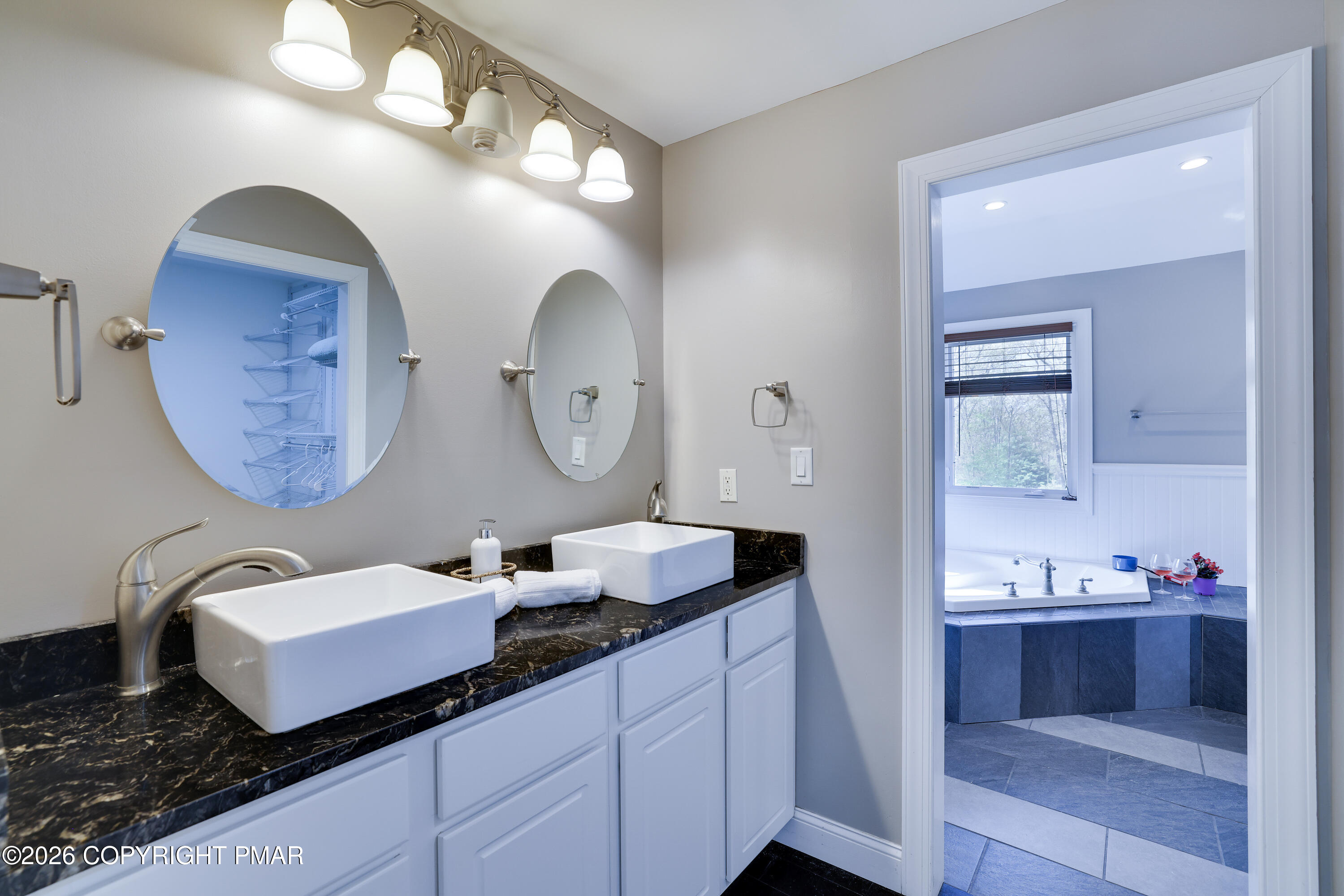 659 Behrens Road Jim Thorpe, PA 18229 - Photo 22 of 57 a bathroom with a granite countertop double vanity sink and a mirror