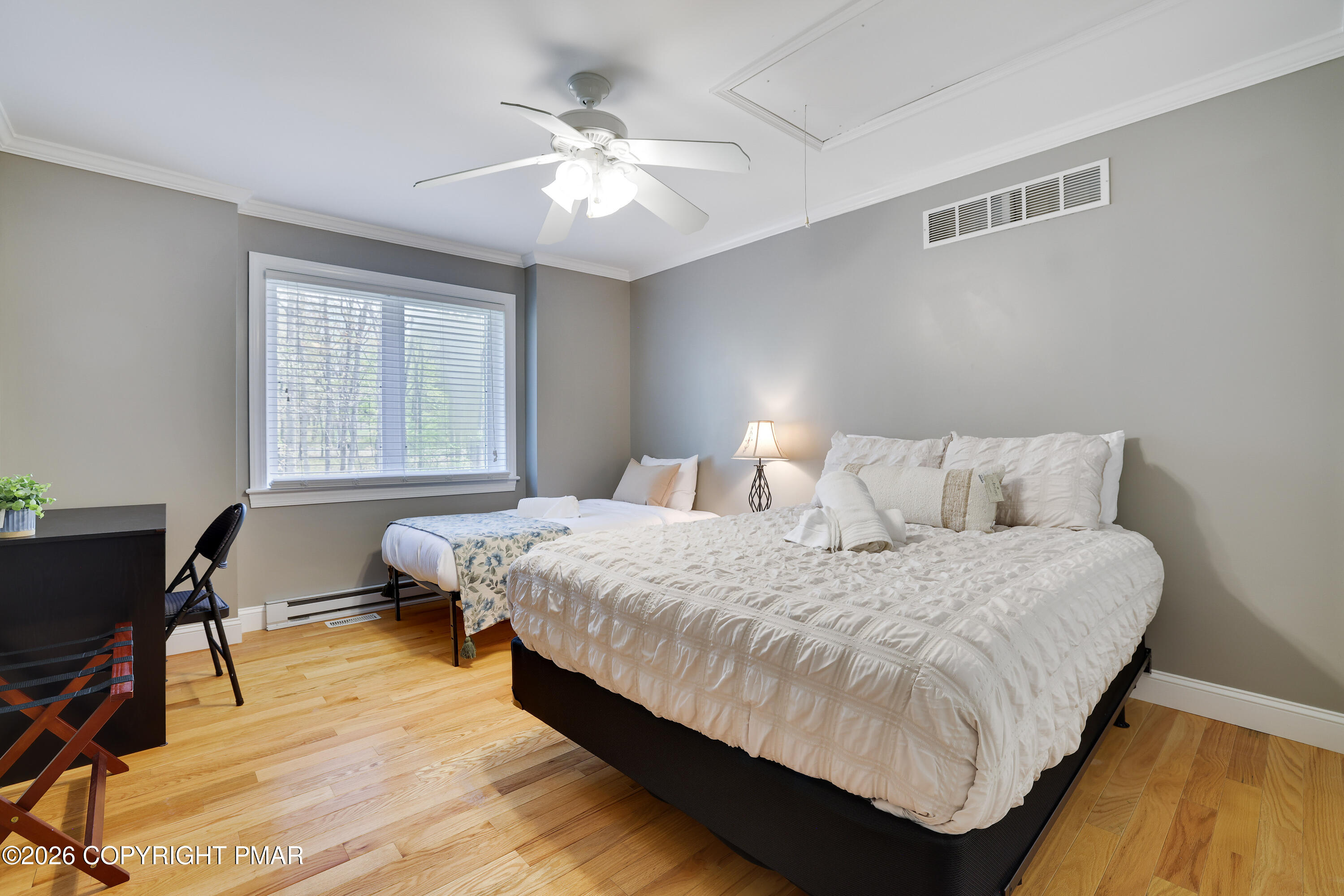 659 Behrens Road Jim Thorpe, PA 18229 - Photo 26 of 57 a bedroom with a bed and a table
