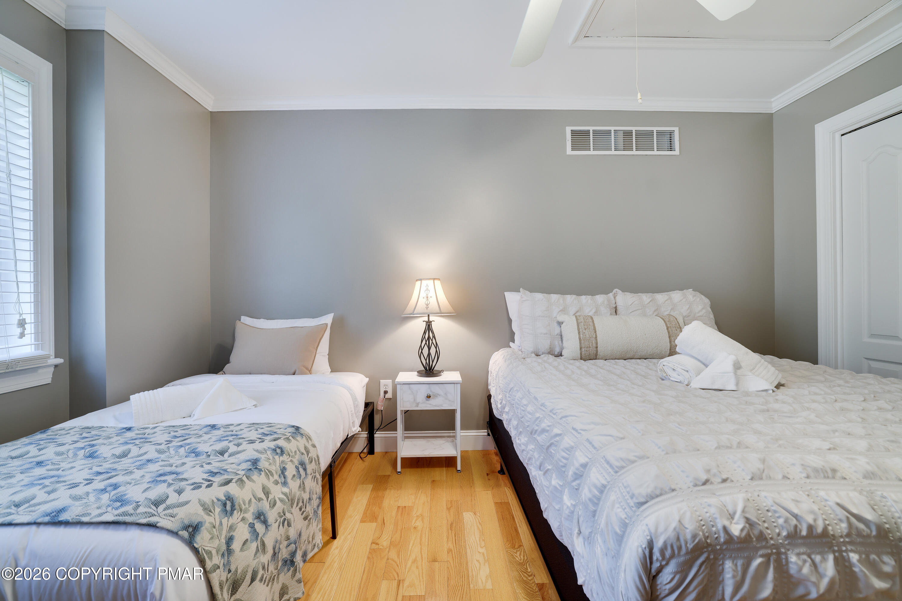 659 Behrens Road Jim Thorpe, PA 18229 - Photo 27 of 57 a large bed sitting in a bedroom next to a window