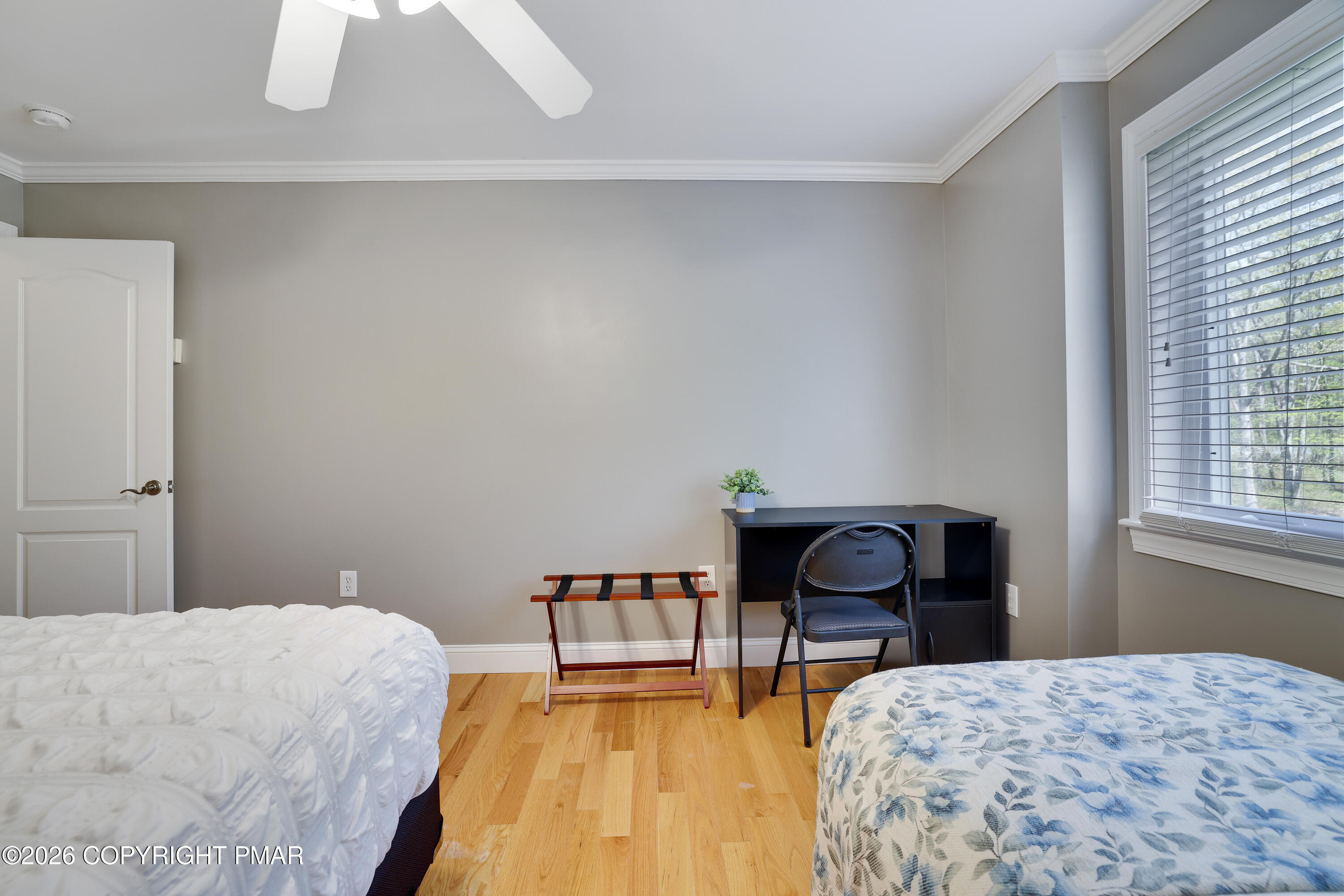 659 Behrens Road Jim Thorpe, PA 18229 - Photo 28 of 57 a bedroom with a bed and a lamp on table