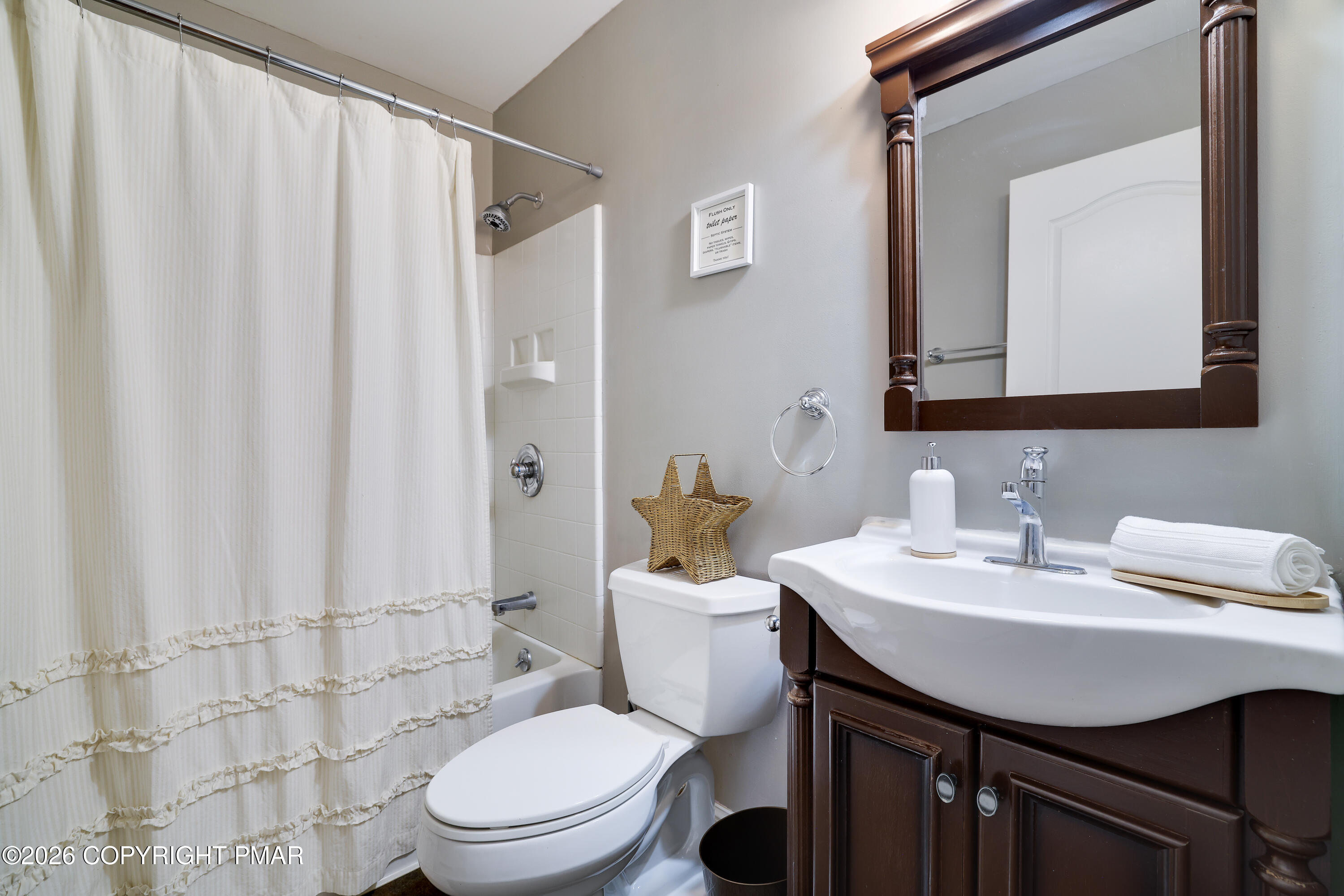 659 Behrens Road Jim Thorpe, PA 18229 - Photo 29 of 57 a bathroom with a sink a toilet and shower curtain
