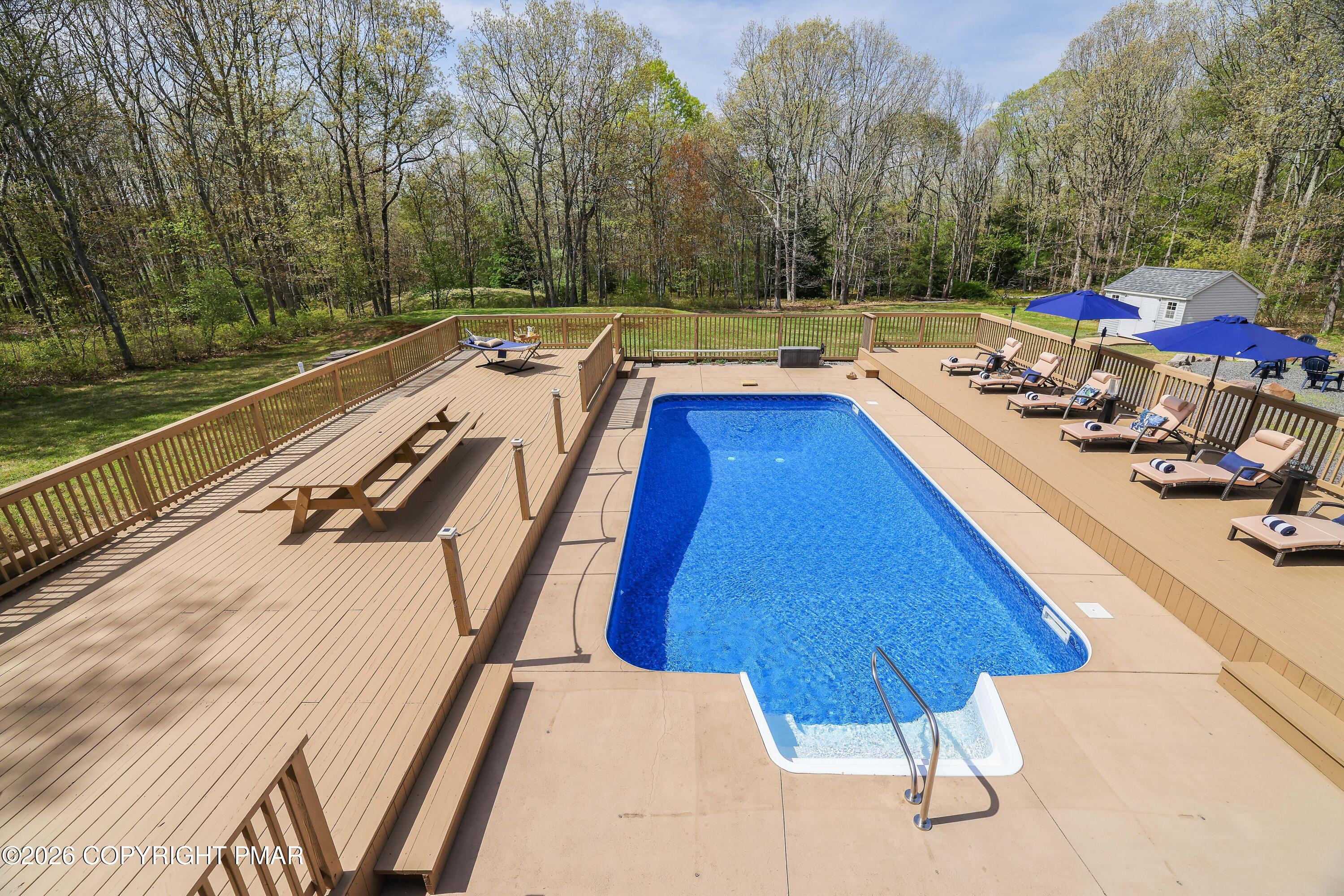 659 Behrens Road Jim Thorpe, PA 18229 - Photo 3 of 57 a view of roof deck with chairs and wooden floor