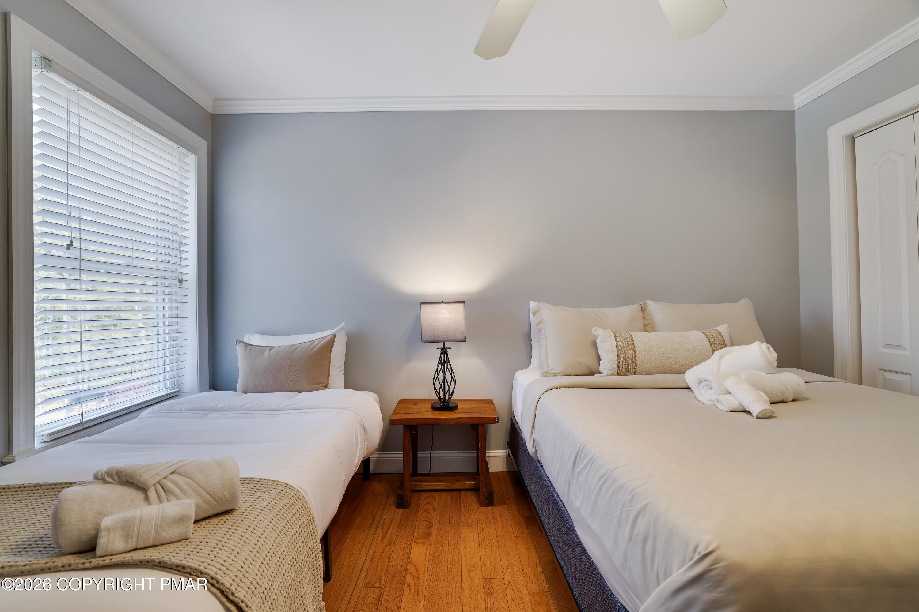 659 Behrens Road Jim Thorpe, PA 18229 - Photo 31 of 57 a bedroom with a bed and lamp