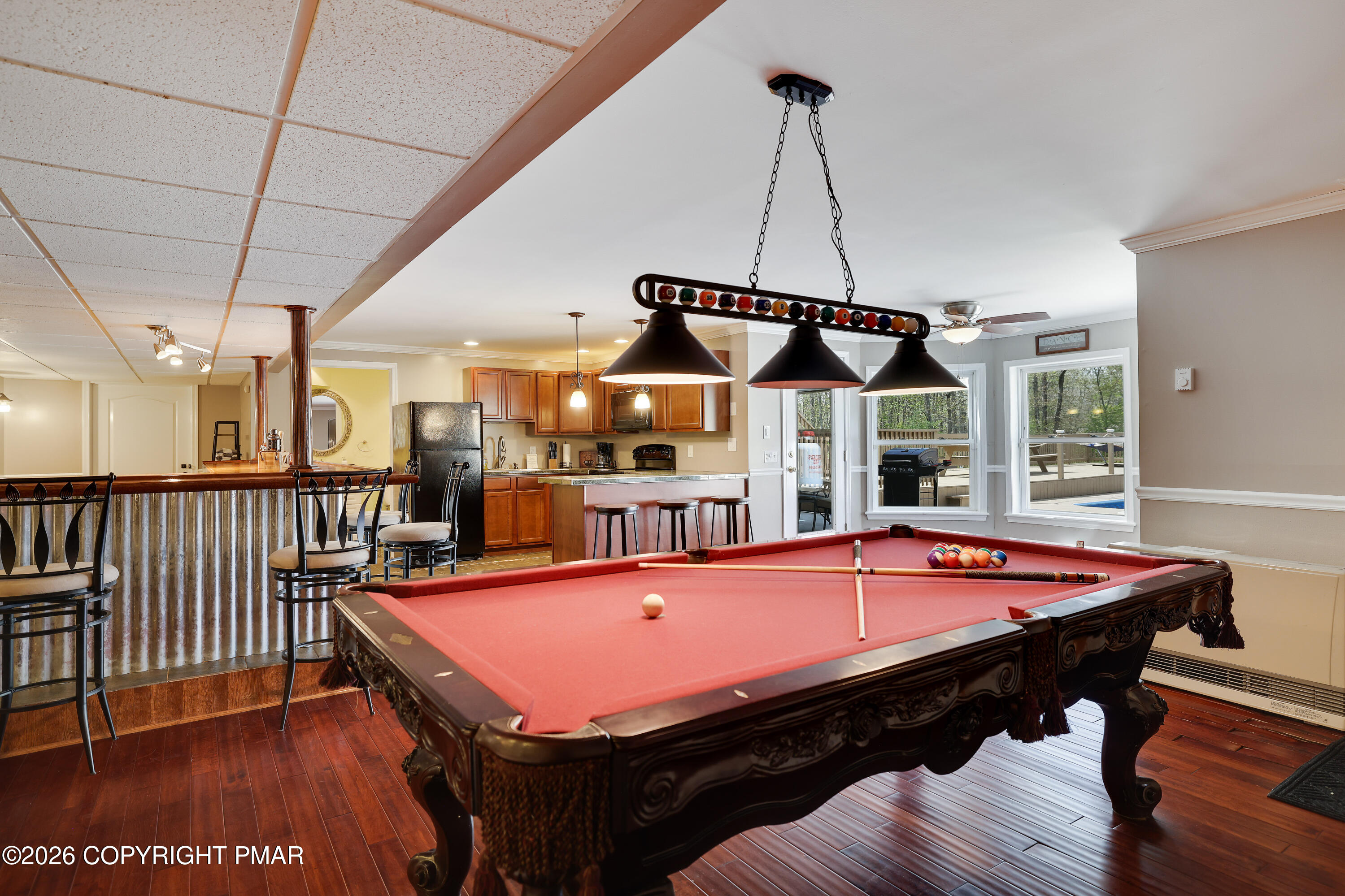 659 Behrens Road Jim Thorpe, PA 18229 - Photo 38 of 57 a pool table sitting on top of a wooden floor