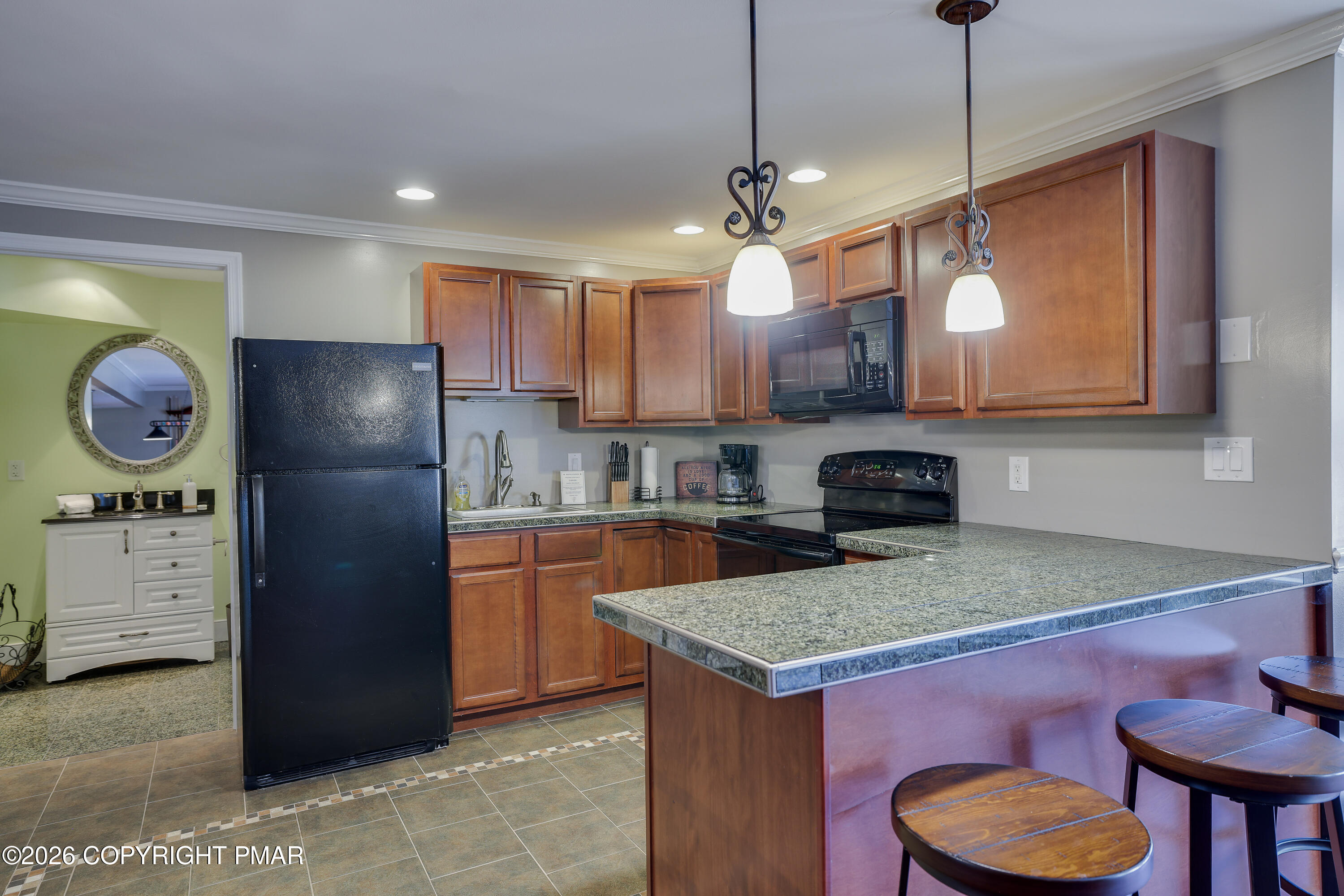 659 Behrens Road Jim Thorpe, PA 18229 - Photo 41 of 57 a kitchen with stainless steel appliances granite countertop a refrigerator a stove a sink dishwasher and a refrigerator with wooden floor