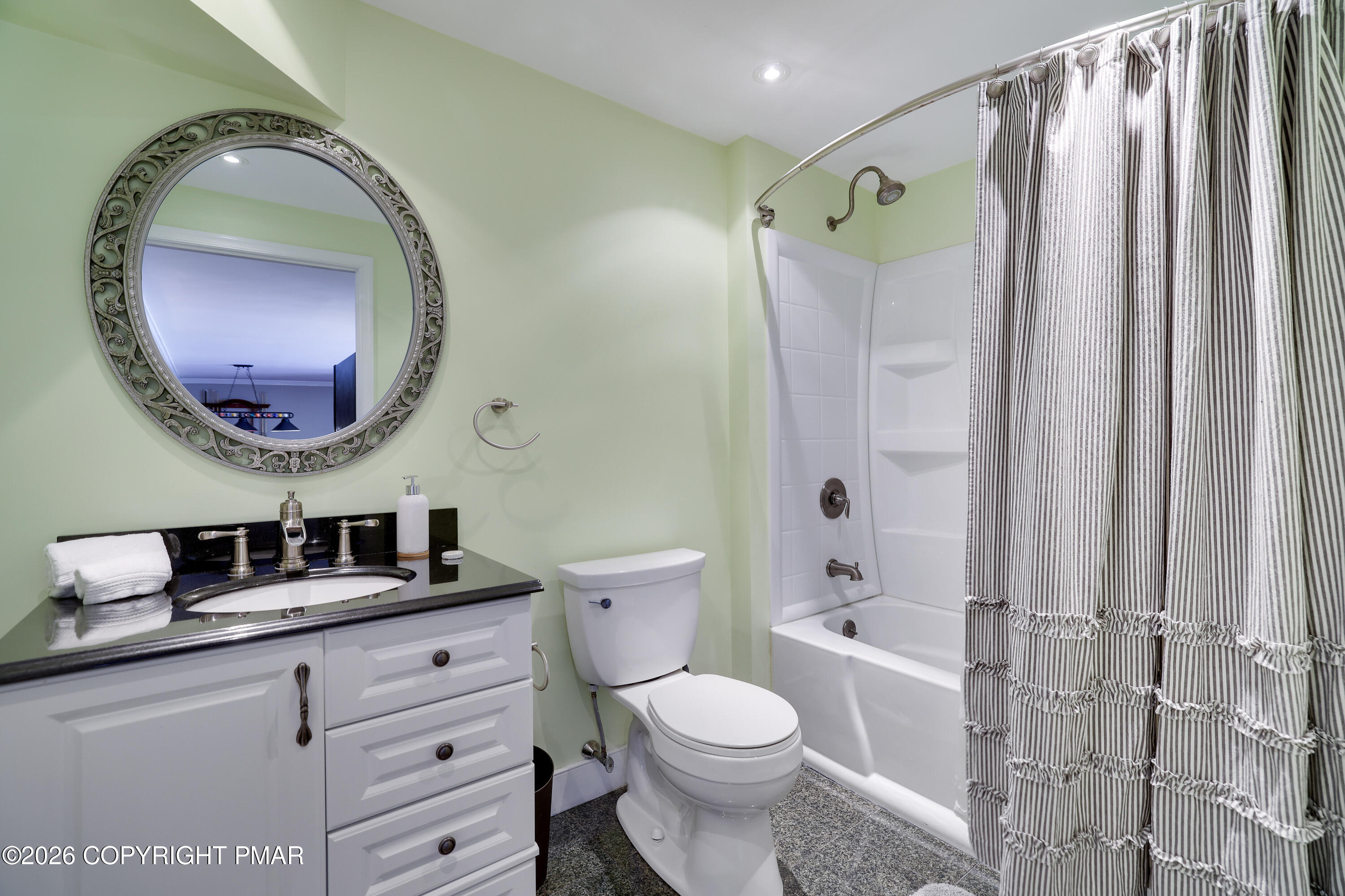 659 Behrens Road Jim Thorpe, PA 18229 - Photo 42 of 57 a bathroom with a toilet a sink a mirror a bathtub and vanity