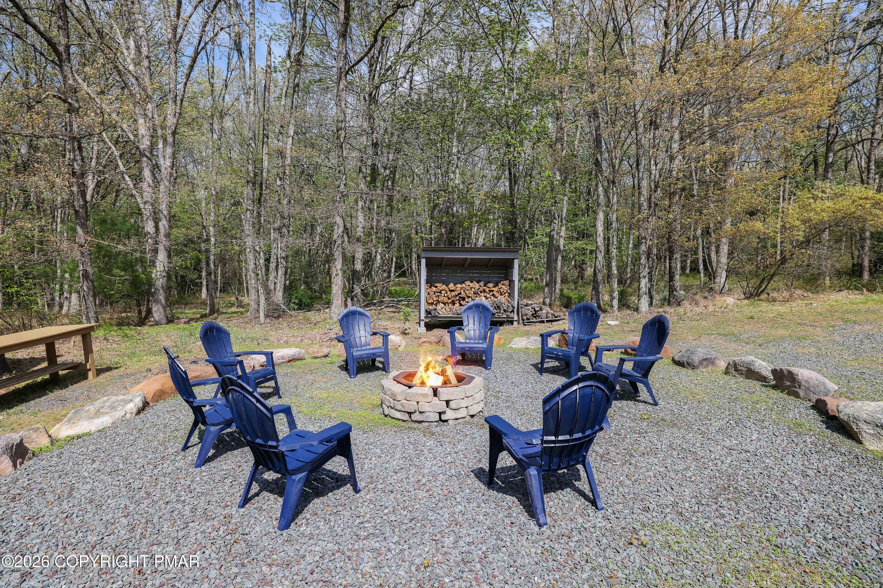 659 Behrens Road Jim Thorpe, PA 18229 - Photo 49 of 57 a view of a backyard with sitting area