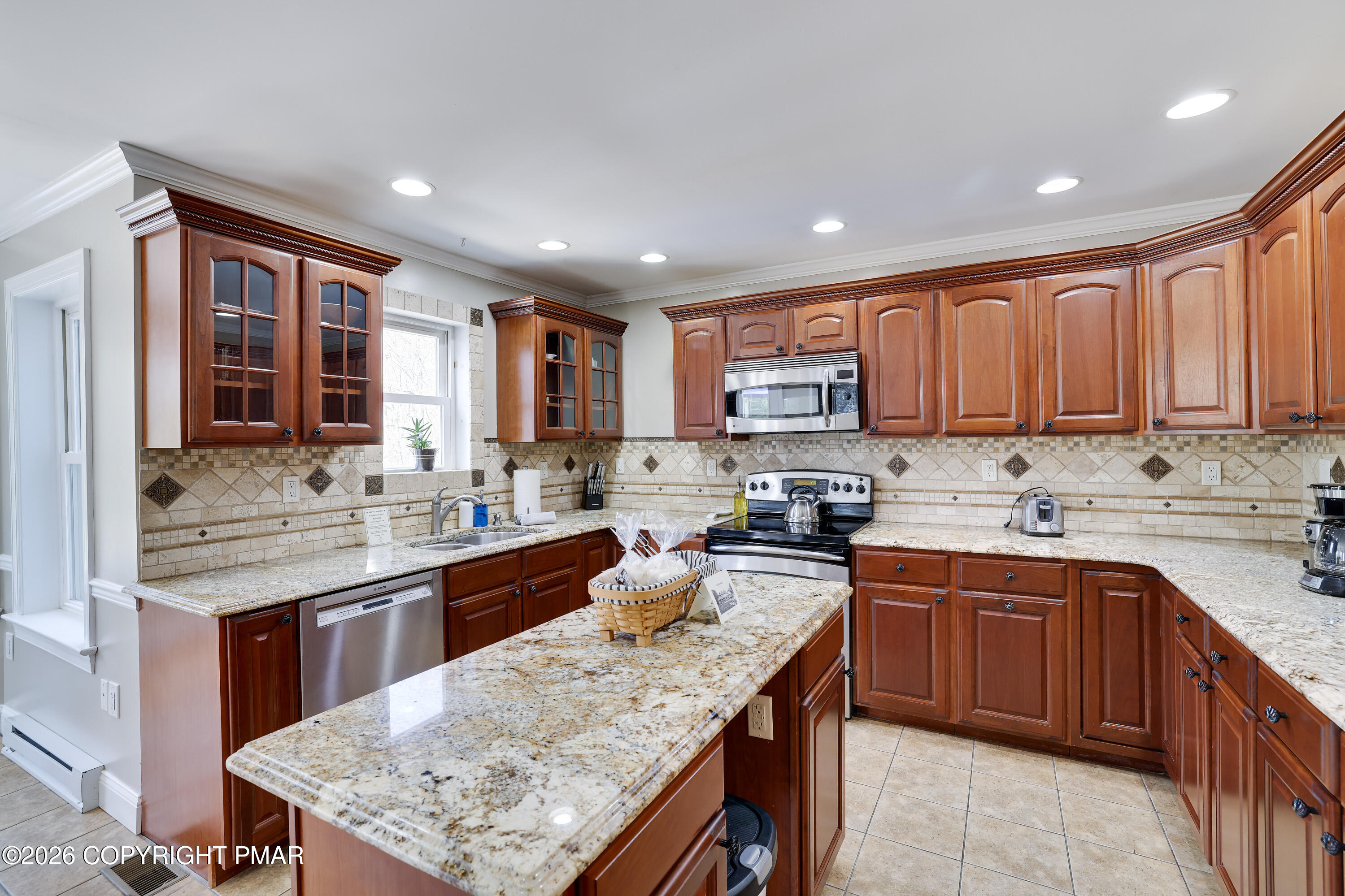 659 Behrens Road Jim Thorpe, PA 18229 - Photo 6 of 57 a kitchen with stainless steel appliances granite countertop wooden cabinets counter space and a sink