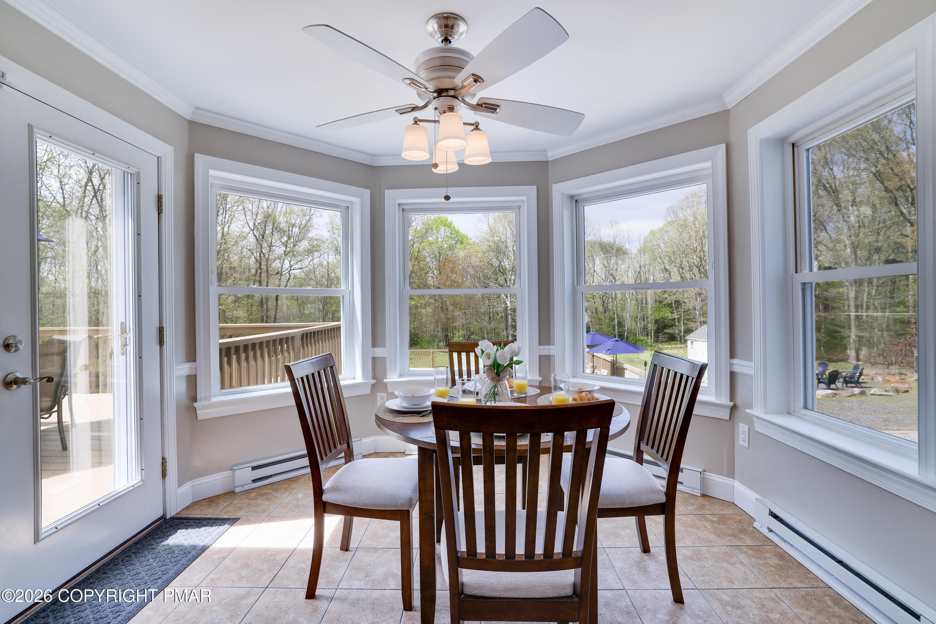 659 Behrens Road Jim Thorpe, PA 18229 - Photo 7 of 57 a dining room with furniture a chandelier and wooden floor