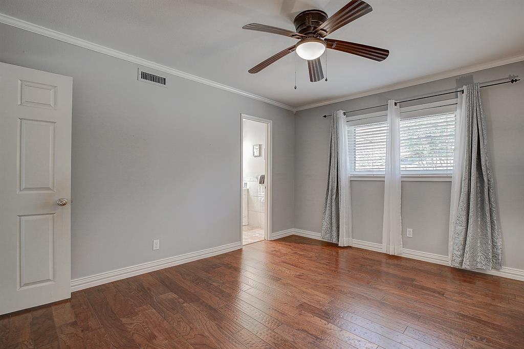 5302 Saddleback Road Garland, TX 75043 - Photo 18 of 31 Primary Bedroom