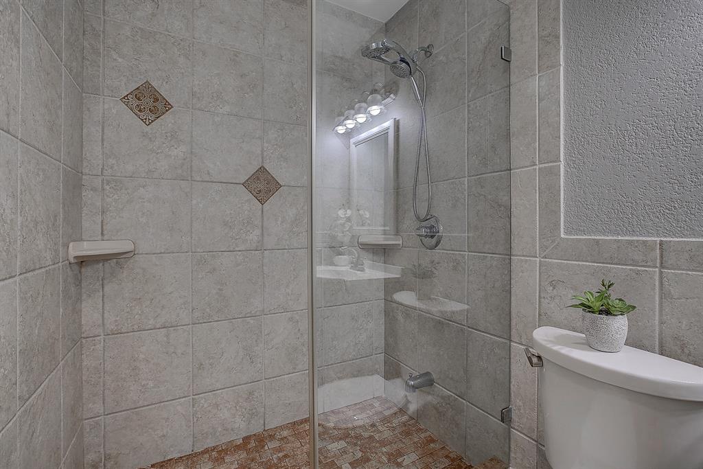 5302 Saddleback Road Garland, TX 75043 - Photo 20 of 31 Primary Bathroom
