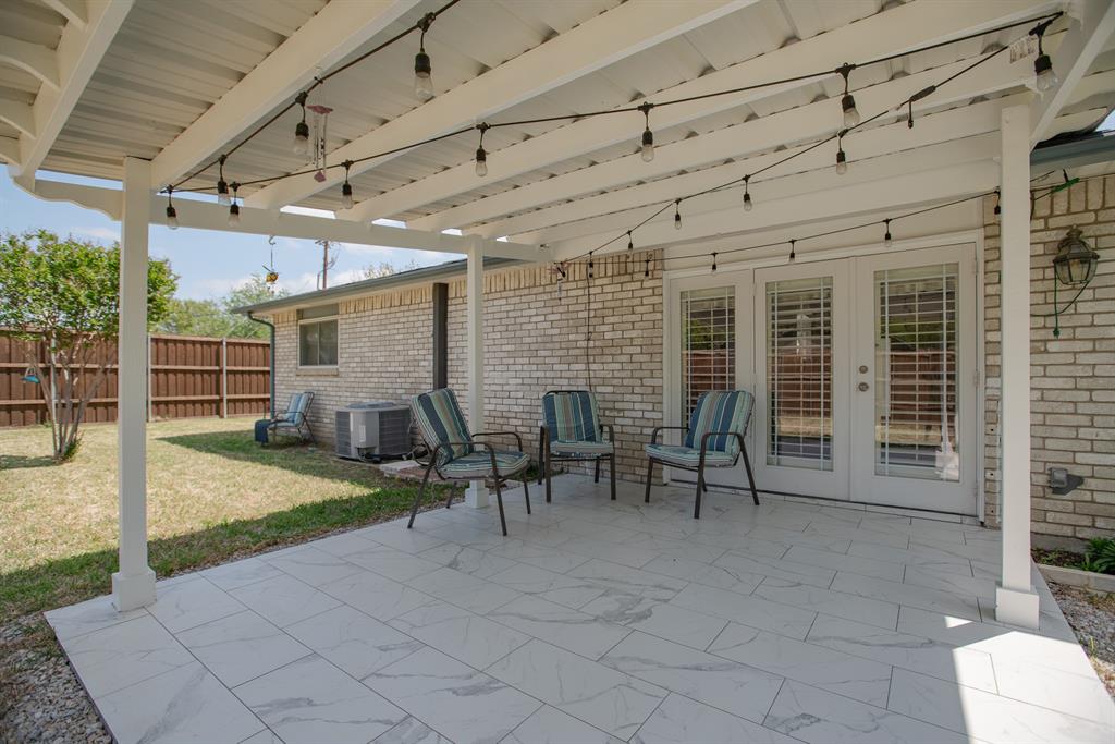 5302 Saddleback Road Garland, TX 75043 - Photo 27 of 31 Back Covered Patio