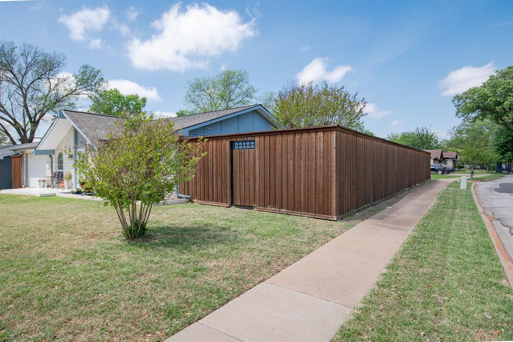5302 Saddleback Road Garland, TX 75043 - Photo 4 of 31 Board-on-board fence updated in 2024.
