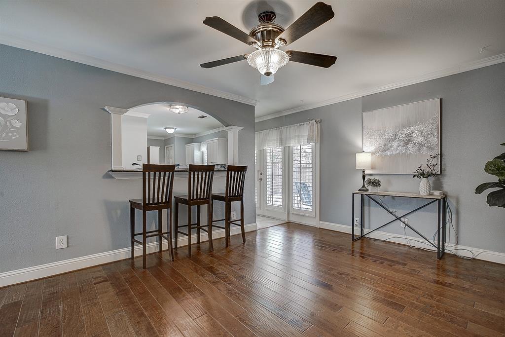 5302 Saddleback Road Garland, TX 75043 - Photo 9 of 31 Main Living Area featuring breakfast bar.