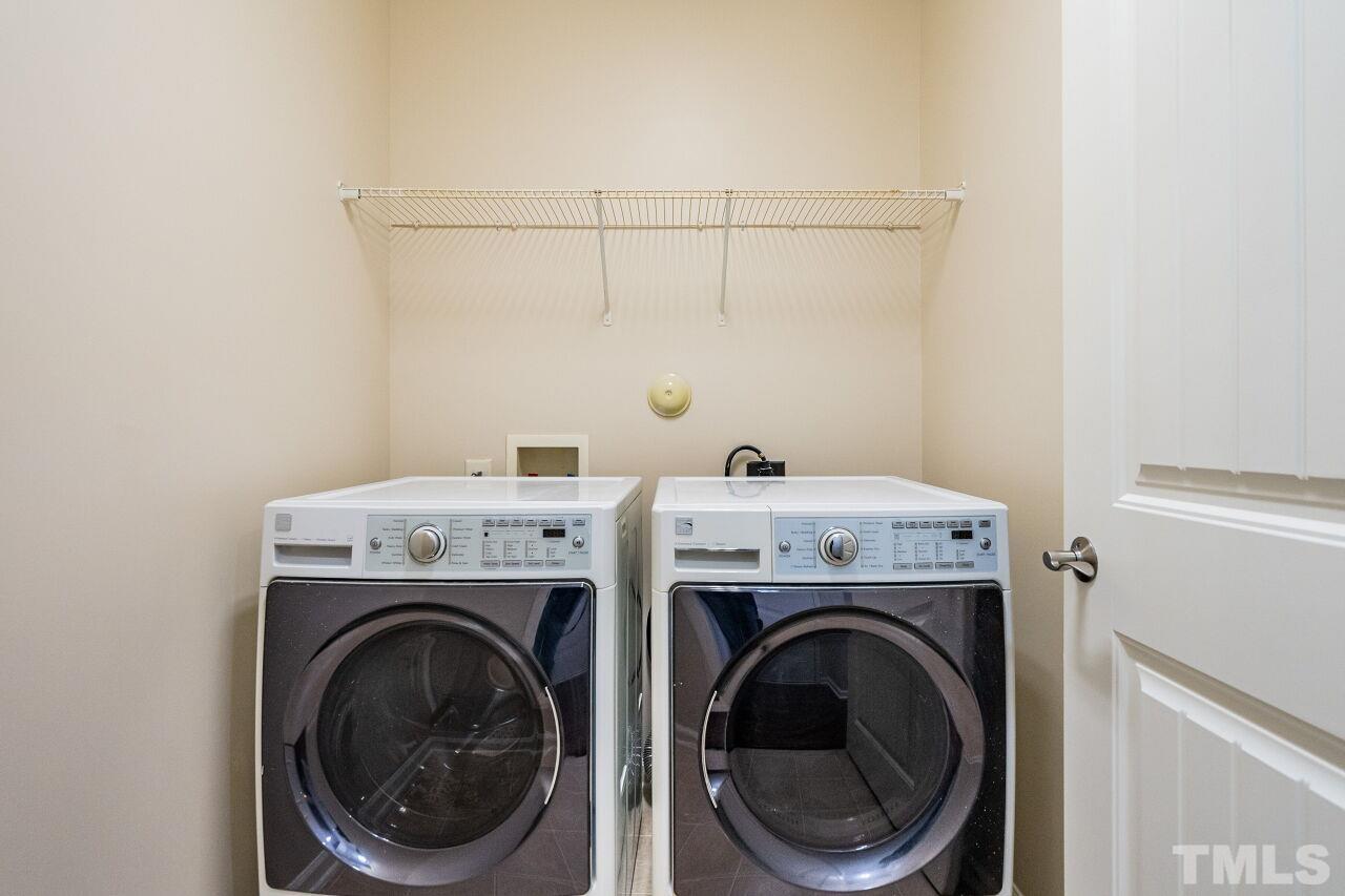 4713 Gaelic Trail Raleigh, NC 27604 - Photo 16 of 26 a utility room with dryer and washer