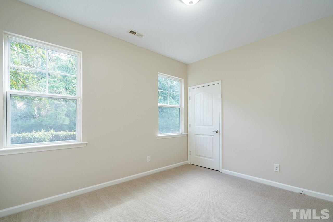 4713 Gaelic Trail Raleigh, NC 27604 - Photo 25 of 26 an empty room with windows