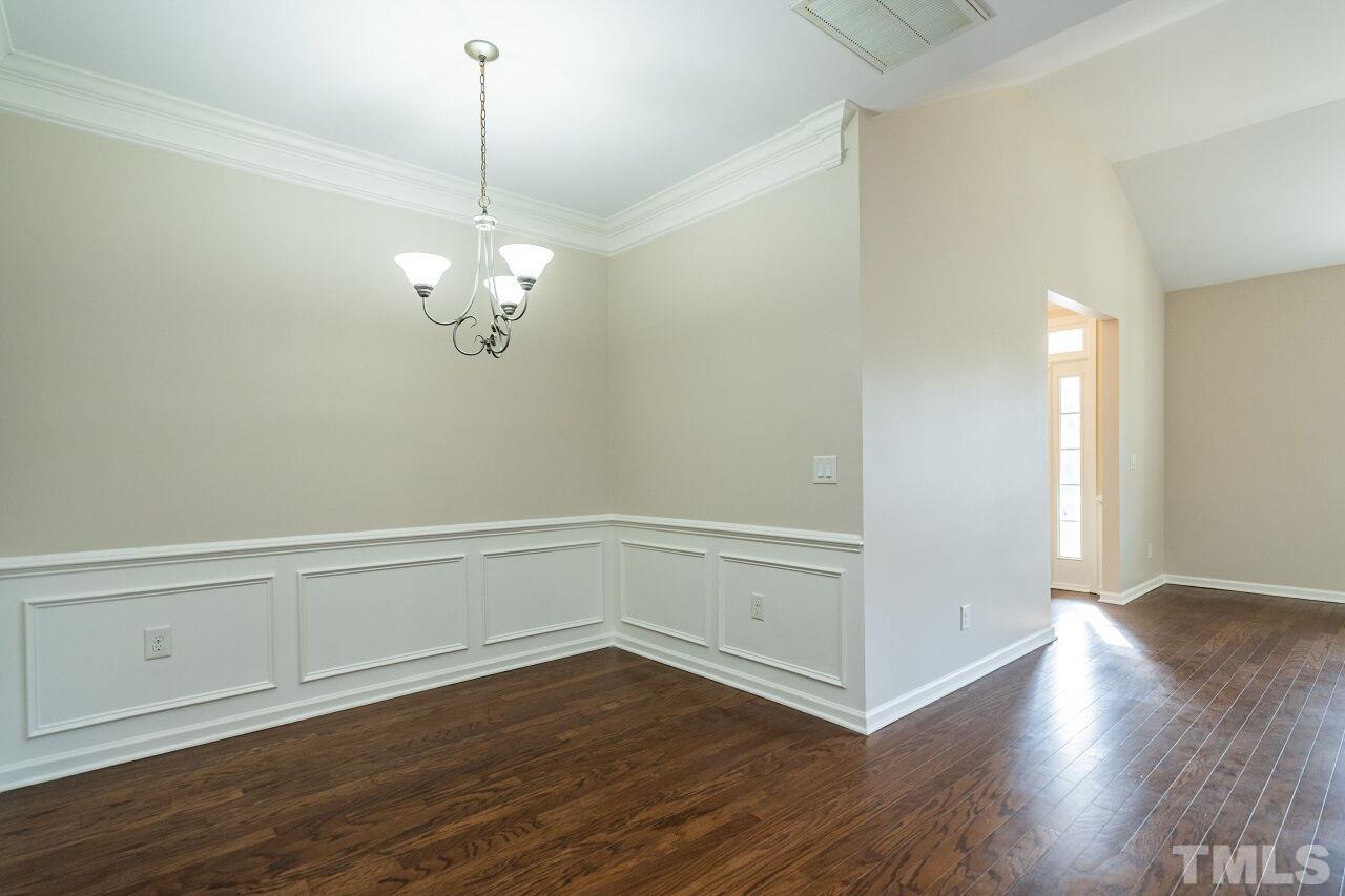 4713 Gaelic Trail Raleigh, NC 27604 - Photo 9 of 26 a view of a room with wooden floor