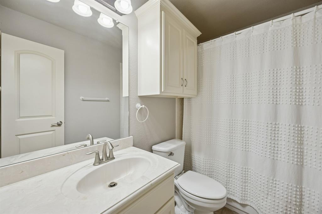 1520 Snider Court Lucas, TX 75002 - Photo 30 of 40 2nd floor hall bathroom with tub and shower services bedroom 3 and guests visiting the upstairs entertainment rooms.