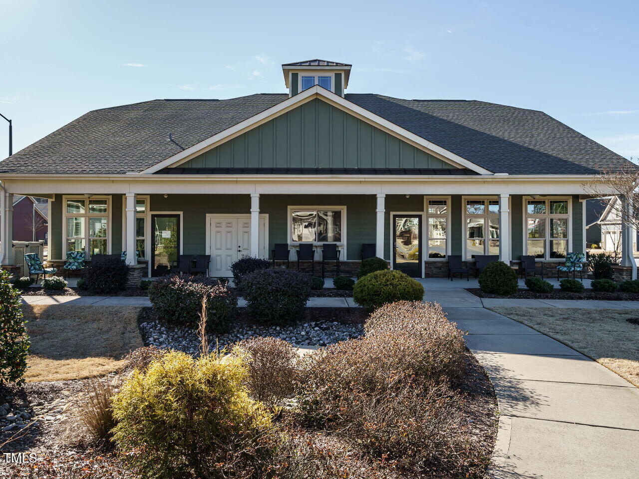 116 Telluride Trail Garner, NC 27529 - Photo 33 of 40 a front view of house with yard outdoor seating and garden