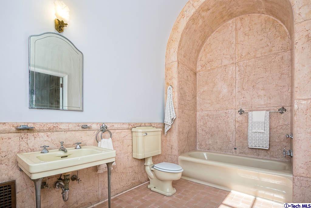 1199 Chateau Road Pasadena, CA 91105 - Photo 19 of 34 a bathroom with a sink toilet and shower