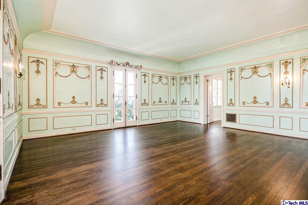 1199 Chateau Road Pasadena, CA 91105 - Photo 20 of 34 a view of an empty room with wooden floor and a window