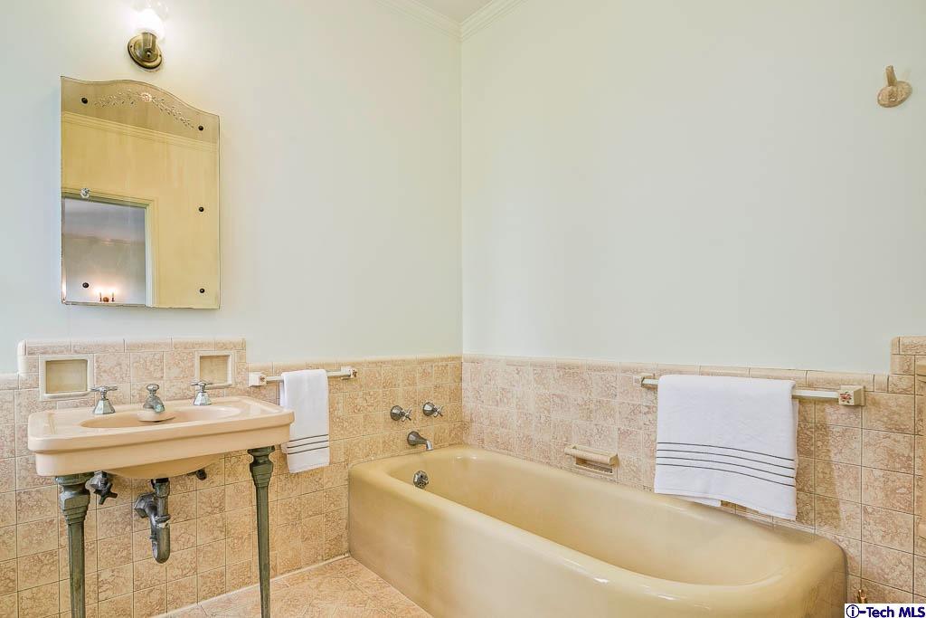 1199 Chateau Road Pasadena, CA 91105 - Photo 25 of 34 a bathroom with a sink and a bathtub