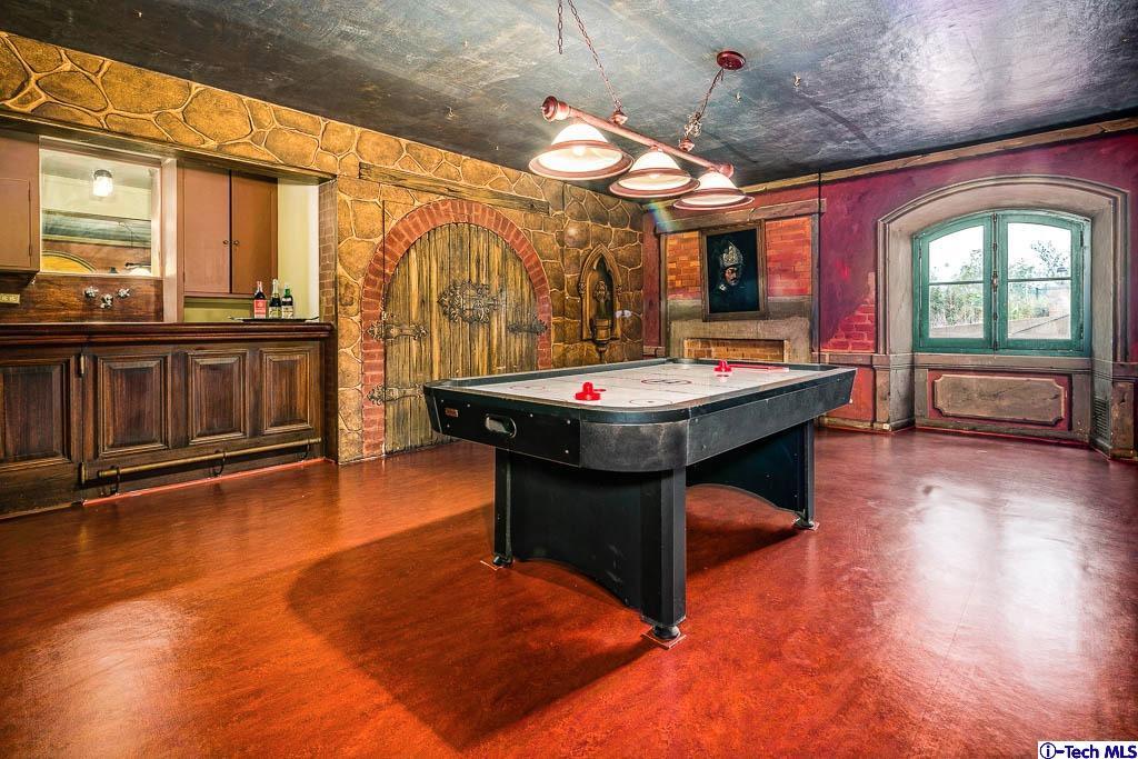 1199 Chateau Road Pasadena, CA 91105 - Photo 28 of 34 a room with pool table and wooden floor
