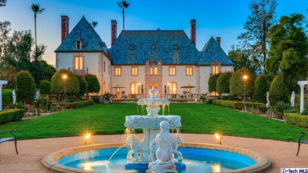 1199 Chateau Road Pasadena, CA 91105 - Photo 4 of 34 a front view of a house with garden