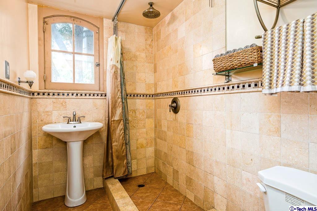 1199 Chateau Road Pasadena, CA 91105 - Photo 32 of 34 a bathroom with a sink and a shower