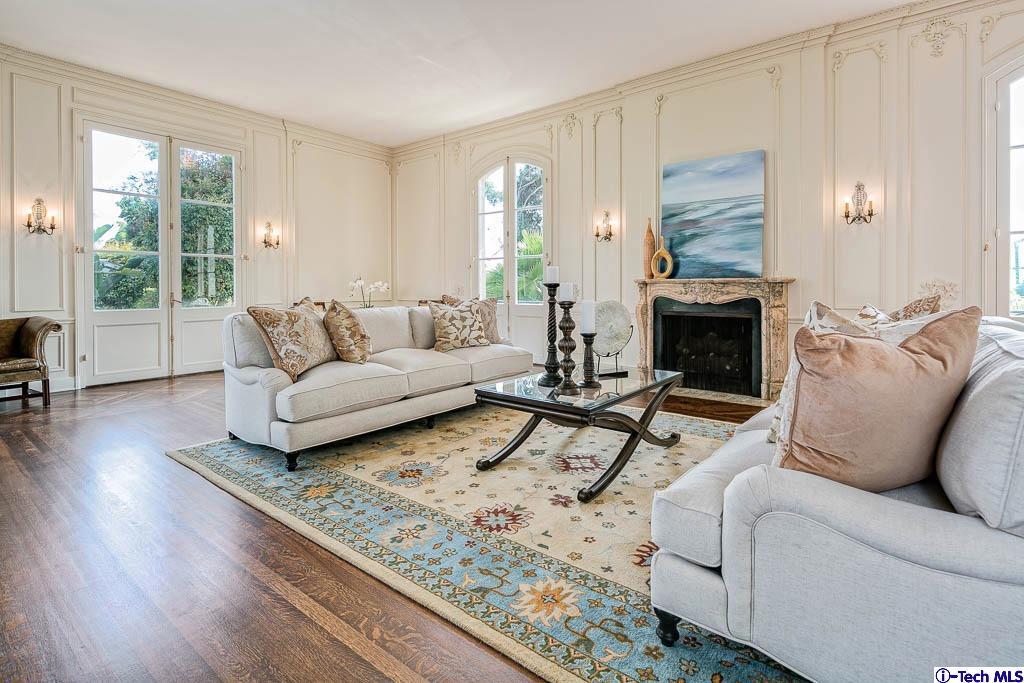 1199 Chateau Road Pasadena, CA 91105 - Photo 9 of 34 a living room with furniture and a fireplace