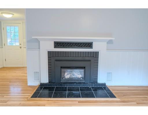 218 Ellis Road Westminster, MA 01473 - Photo 12 of 30 a living room with furniture and a fireplace