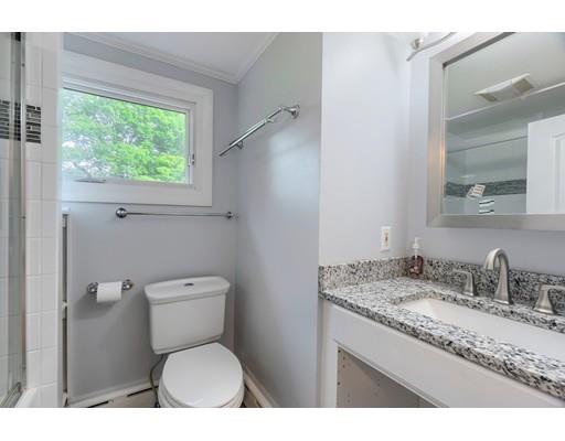 218 Ellis Road Westminster, MA 01473 - Photo 24 of 30 a bathroom with a granite countertop toilet sink and mirror