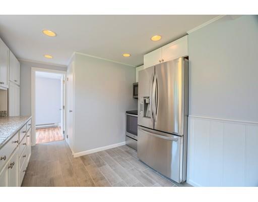 218 Ellis Road Westminster, MA 01473 - Photo 7 of 30 a view of a kitchen with a refrigerator and a sink