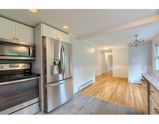 218 Ellis Road Westminster, MA 01473 - Photo 8 of 30 a kitchen with stainless steel appliances a refrigerator and a stove top oven